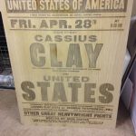 Laser engraved poster student artwork of Cassius Clay vs United States onto solid wood.